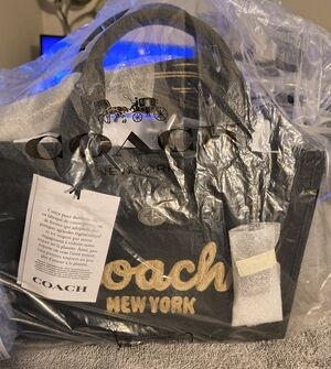 New Coach Black and Gold Signature Cargo Tote 26 Still In Wrapping.
